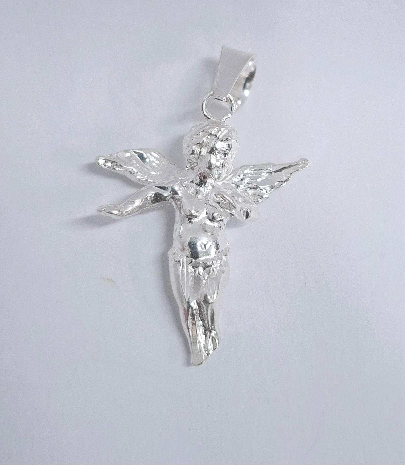 Dije Plata Ley .925 en forma de Querubín , MOD.DR015