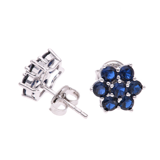 ARETES EN PLATA LEY .925, CON RODIO , ZIRCONIA AAA AZUL ZAFIRO Y BLANCO , EN FORMA DE FLOR