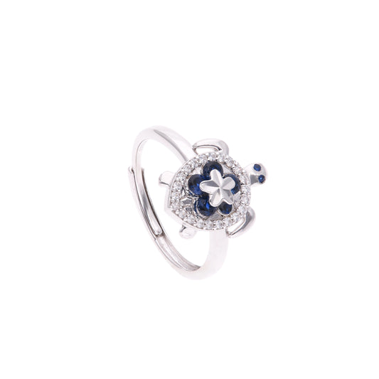 ANILLO EN PLATA LEY .925, CON RODIO , ZIRCONIA AAA AZUL ZAFIRO Y BLANCO, TORTUGA, AJUSTABLE