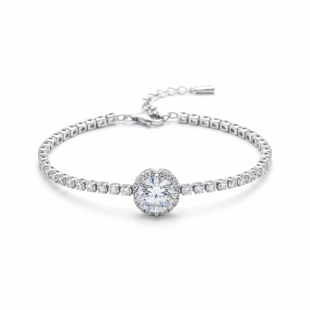 Pulsera tennis en plata .925 con cadena continua de zircones blancos y centro focal de zircón blanco grande con halo floral