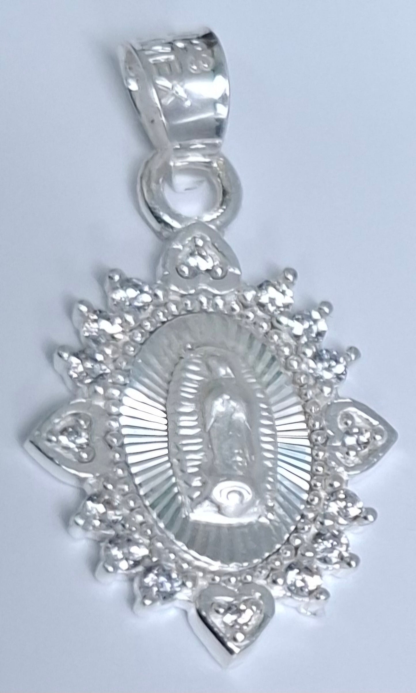Dije de Plata .925 En forma de la Virgen de Guadalupe con topacio blanco MOD. DRP027LP - Joyería Religiosa