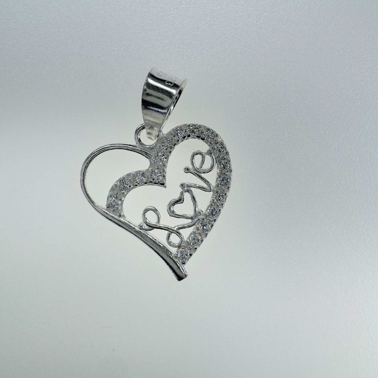 Dije colgante corazón plata 925 con piedras circonias y palabra Love ideal para regalo joyería elegante