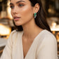 Aretes Plata Ley 925 con Rodio y Zirconia AAA Color Verde Esmeralda y Blanco en Forma de Dos Flores