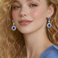 ARETES EN PLATA LEY .925, CON RODIO , ZIRCONIA AAA AZUL ZAFIRO Y BLANCO , REDONDO