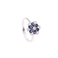 ANILLO EN PLATA LEY .925, CON RODIO , ZIRCONIA AAA AZUL ZAFIRO Y BLANCO  , EN FORMA DE FLOR