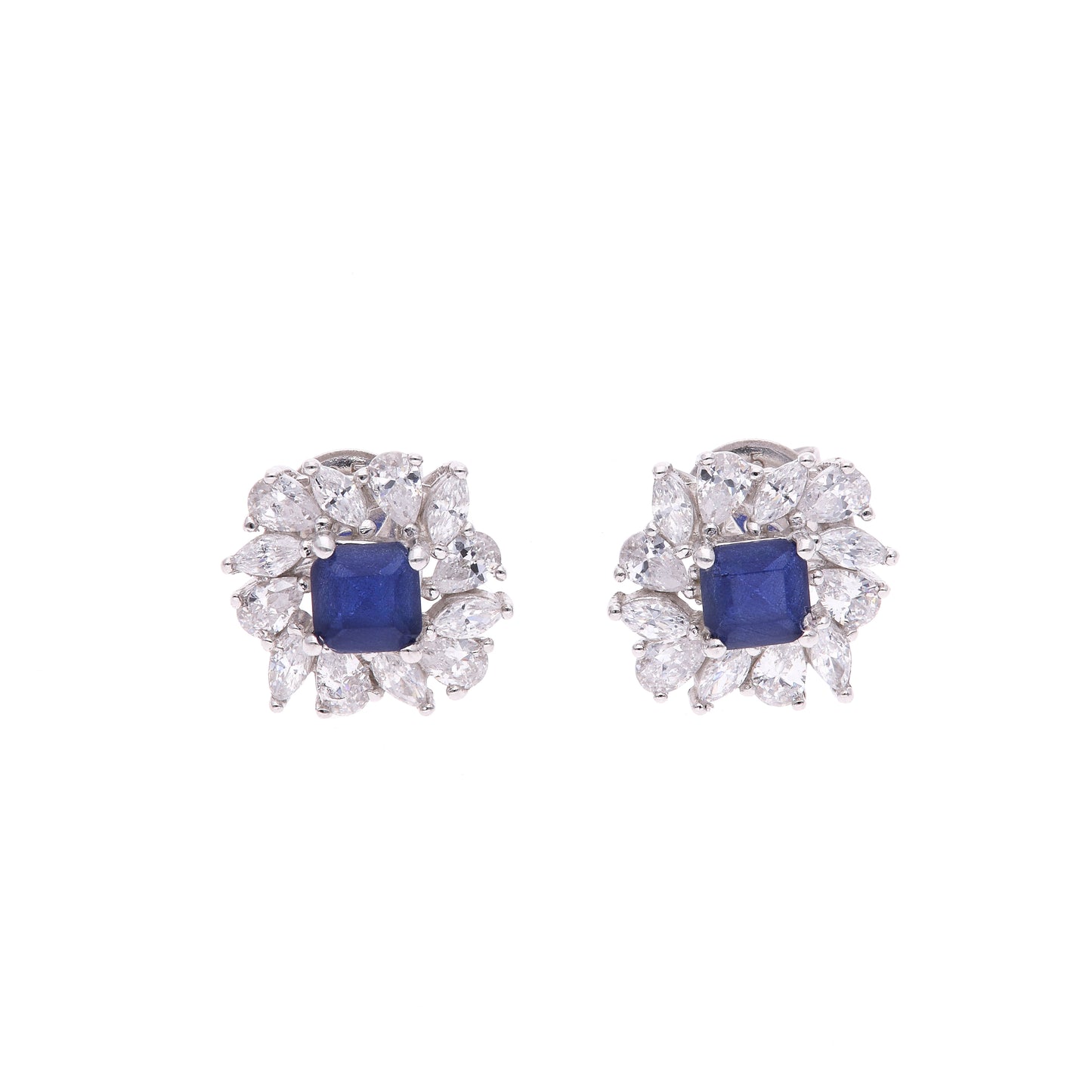 BROQUEL EN PLATA LEY .925, CON RODIO , ZIRCONIA AAA AZUL ZAFIRO Y BLANCO  , EN FORMA DE FLOR