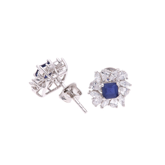 BROQUEL EN PLATA LEY .925, CON RODIO , ZIRCONIA AAA AZUL ZAFIRO Y BLANCO  , EN FORMA DE FLOR