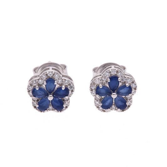 BROQUEL EN PLATA LEY .925, CON RODIO , TOPACIO AZUL Y BLANCO EN FORMA DE FLOR DE 5 PETALOS
