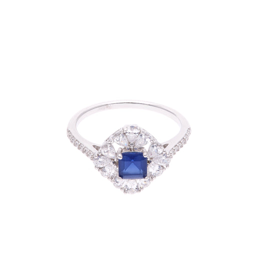 ANILLO EN PLATA LEY .925, CON RODIO , ZIRCONIA AAA AZUL ZAFIRO Y BLANCO  , EN FORMA DE FLOR
