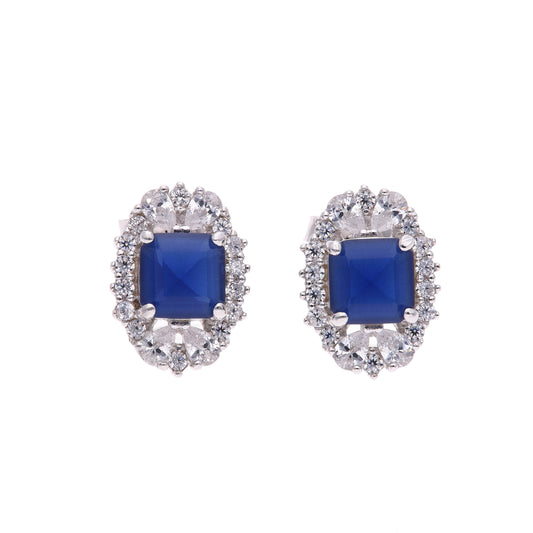 BROQUEL EN PLATA LEY .925, CON RODIO , ZIRCONIA AAA AZUL ZAFIRO Y BLANCO  , EN FORMA DE FLOR