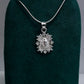 Dije de Plata .925 Forma Virgen de Guadalupe con Topacio blanco Mod. DRP026LP - Joyería Religiosa