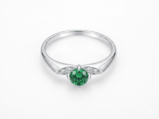 Anillo de Plata .925 - Banda Cónica con Alas de Zircones Blancos y Zircón Verde Esmeralda Central